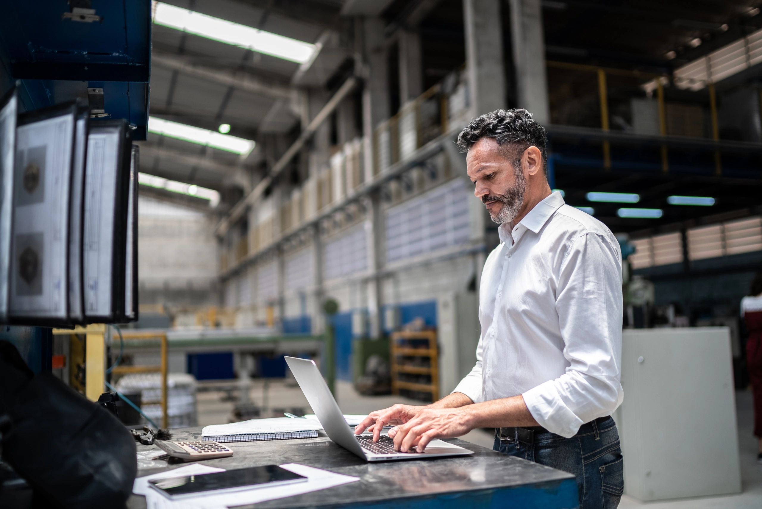 Operations team member using a laptop